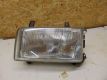 Frontscheinwerfer links <br>VW TRANSPORTER IV KASTEN (70XA) 2.4 D